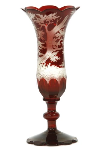 Lot 172 - A late 19th century Bohemian glass ruby flash spill vase