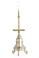 Lot 564 - A brass standard lamp