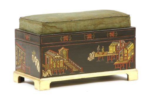 Lot 533 - A lacquered box ottoman