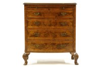 Lot 536 - An early 20th century figured walnut bow fronted bachelors chest