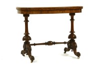 Lot 627 - A Victorian figured walnut table