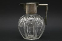 Lot 142 - A silver mounted claret jug