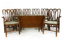 Lot 553 - A 19th century mahogany drop flap dining table