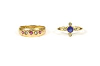 Lot 22 - A late Edwardian gold blue doublet ring with four simulated pearls