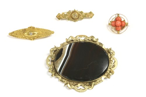 Lot 52 - A Victorian 15ct gold single stone diamond brooch
