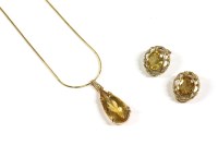 Lot 44 - A gold single stone pear shaped citrine pendant