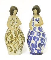 Lot 177 - A pair of stoneware skittle figures