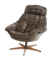 Lot 482 - A brown leather lounge chair