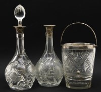 Lot 176 - A pair of silver mounted decanters