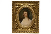 Lot 163 - A small oval miniature portrait of a lady