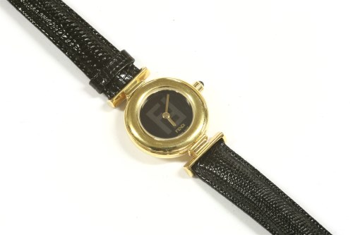 Lot 63 - A ladies gold plated Fendi quartz strap watch