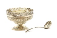 Lot 127 - A silver sugar bowl and a sifting spoon