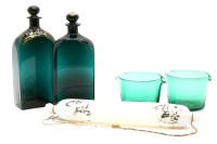 Lot 299 - Two green glass decanters