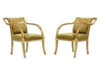 Lot 552 - A pair of French empire style gilt side chairs