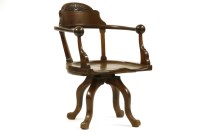 Lot 520 - A late 19th/early 20th century mahogany swivel desk chair