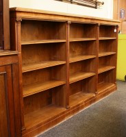 Lot 500 - A Victorian walnut open fronted three section bookcase