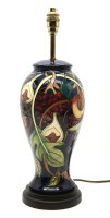 Lot 389 - A Moorcroft Queens Choice table lamp