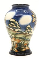 Lot 390 - A Moorcroft 'Wenlock Edge' vase