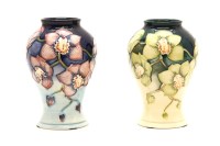 Lot 384 - Two Moorcroft 'Cymbidium' vases
