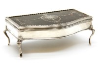 Lot 123 - An early 20th century tortoiseshell and silver pique work jewellery box