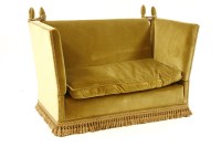 Lot 499 - A green upholstered Knole style two seater settee