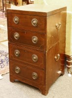 Lot 584 - A mahogany campaign style chest of drawers