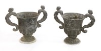 Lot 882 - A pair of lead urns