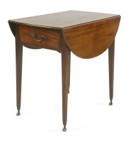 Lot 842 - A George III solid mahogany Pembroke table