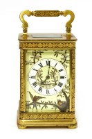 Lot 750 - A French gilt brass and porcelain-mounted carriage clock