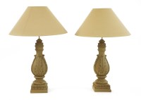 Lot 710 - A pair of large turned wooden and grey painted table lamps