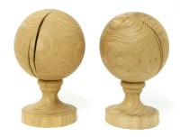 Lot 712 - A pair of turned oak balls