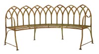 Lot 829 - A Regency-style curved iron garden seat