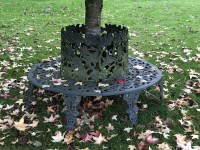 Lot 783 - A cast iron tree seat