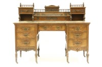 Lot 522 - An Arts and Crafts style oak pedestal desk
