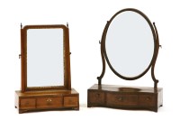 Lot 517 - A George II mahogany toilet mirror