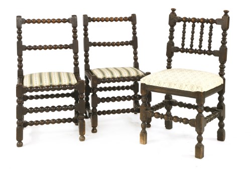 Lot 504 - A pair of bobbin turned chairs