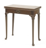 Lot 532 - A George III mahogany fold-over card table