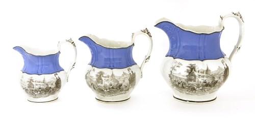 Lot 508 - A set of three graduated Staffordshire pottery 'Irish Repeal' commemorative jugs