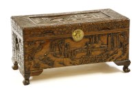 Lot 641 - A small Chinese carved hardwood blanket box