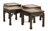 Lot 869 - A set of four Chinese padouk occasional tables
