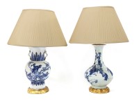 Lot 572 - Two Chinese blue and white vase/table lamps