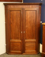 Lot 646 - An Edwardian mahogany strung corner cabinet