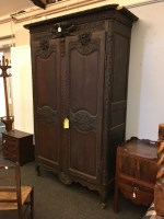 Lot 595 - A French provincial oak armoire