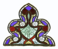 Lot 346 - A set of three stained glass and leaded panels
