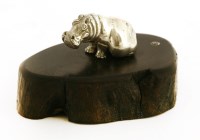 Lot 249 - A contemporary silver sculpture of a seated hippo