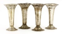Lot 285 - Four Edwardian silver trumpet vases