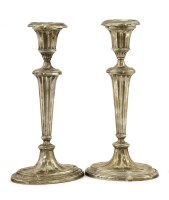 Lot 262 - A pair of silver candlesticks