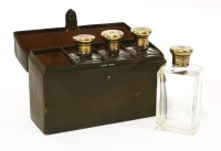 Lot 27 - A set of four glass cologne bottles