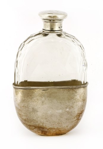 Lot 118 - A late Victorian silver-mounted glass spirit flask