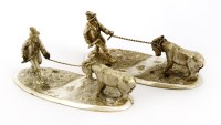 Lot 77 - A pair of novelty electroplated donkey and stream knife rests